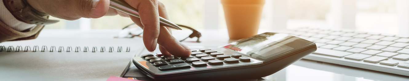 calculator being used for a business loan