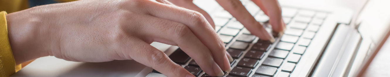 someone typing on a computer